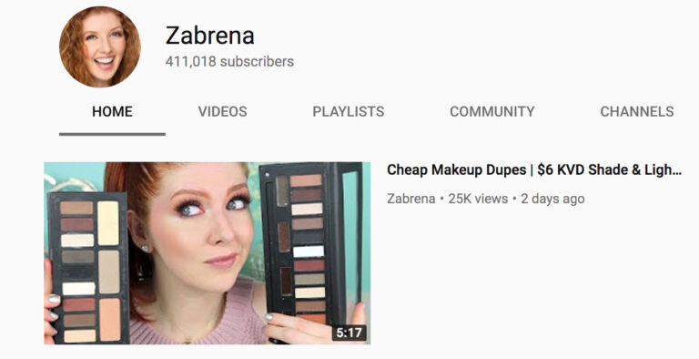 Woman comparing two eyeshadow palettes, looking surprised, with a Biteable video maker title about cheap makeup dupes on a YouTube interface.