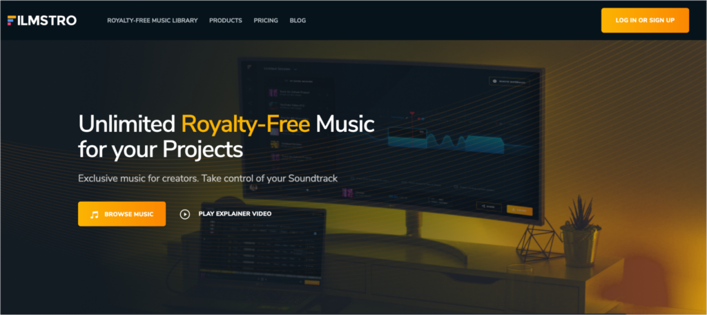 Website homepage promoting unlimited royalty-free music for creative projects with a call to action to browse music or play an explanatory video.