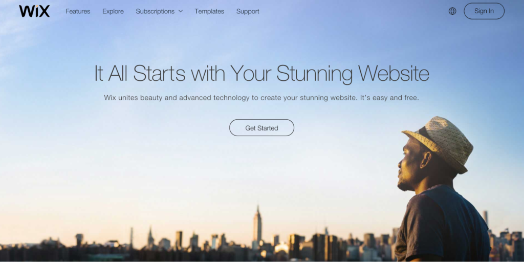 Man looking towards the skyline on a website's promotional banner with a call to action button.