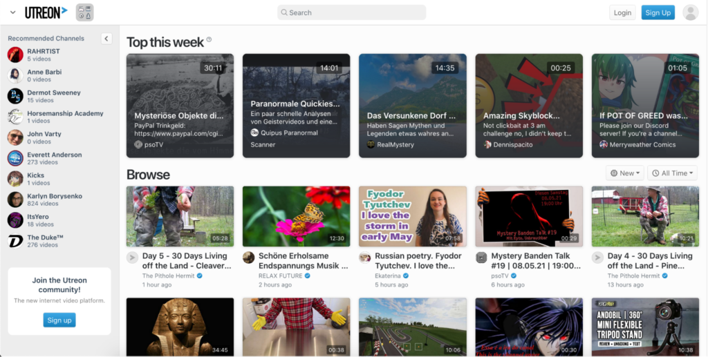 A screenshot displaying a webpage from a video sharing platform, showcasing various video thumbnails for recommended channels and popular content.