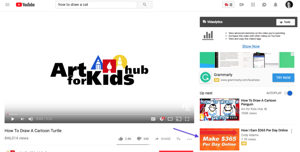 A youtube interface displaying a paused video titled "how to draw a cartoon turtle" from the channel "art for kids hub" with related videos and advertisements on the side.
