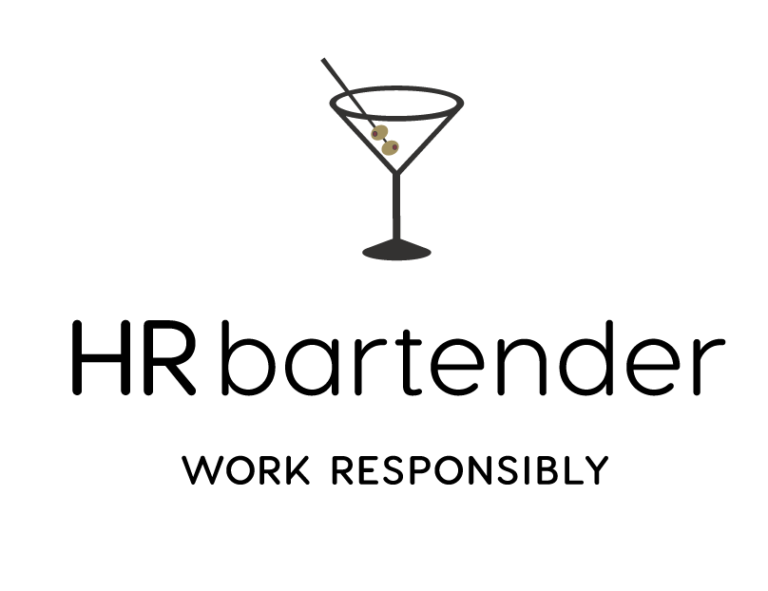 A martini glass with a single olive on a dark background.
