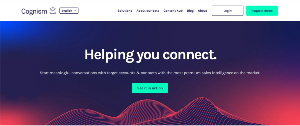 A screenshot of the cognism website homepage featuring a call-to-action "helping you connect" with a "see it in action" button.