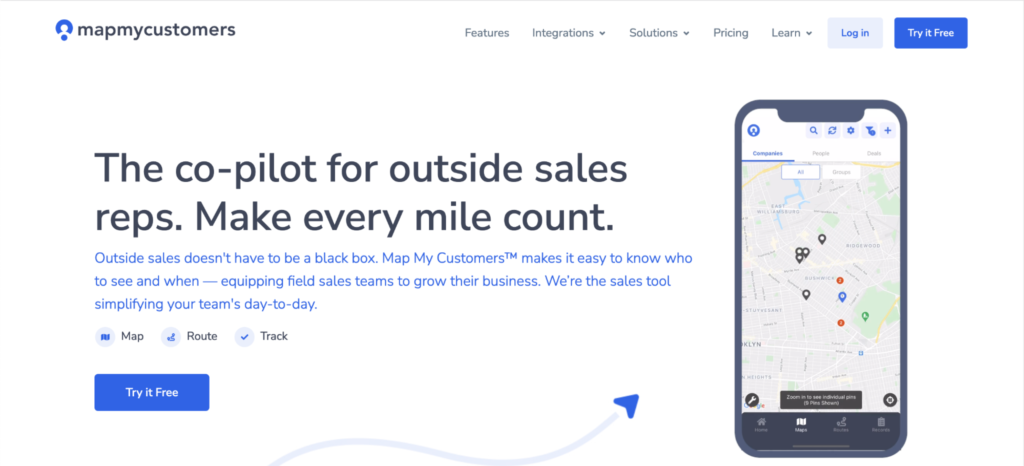 A screenshot of the 'map my customers' webpage featuring a mobile application for optimizing outside sales routes.