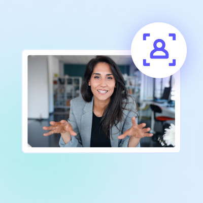 Professional woman gesturing during a Biteable video maker call with a contact icon overlay.