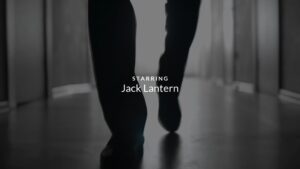 A person walking with the text "starring Jack Lantern" overlayed on the image, created using Biteable video maker.