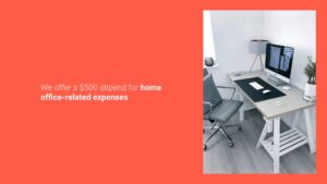 Modern home office setup with a desk supporting two computer monitors, a laptop, a smartphone, and office supplies, accompanied by an ergonomic chair. Integrated into the space is the Biteable video maker for enhanced