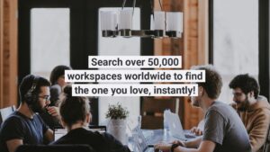 Group of people working on laptops at a long table in a modern, well-lit office space with an overhead lamp and Biteable video maker promotional text overlay.