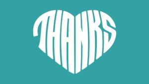A graphic image of a white heart with the word "thanks" written across it in bold, white letters on a teal Biteable video maker background.