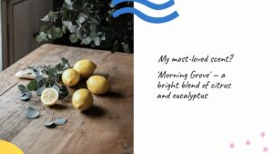 Three lemons and sprigs of eucalyptus are arranged on a wooden table; text on the right describes a citrus and eucalyptus scent called 'Morning Grove.'.