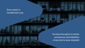 Office building windows at night with text: "Every report is handled with care" and "You have the option to remain anonymous, and retaliation of any kind is never tolerated.