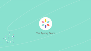 Circular logo with six colored shapes on a light teal background, centered above the text "The Agency Team." Subtle abstract patterns appear in the corners.