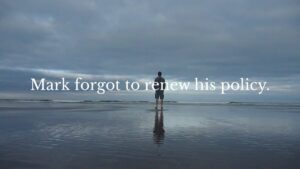 A person stands alone on a beach under a cloudy sky with the text "Mark forgot to renew his policy" displayed across the image.