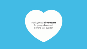 White heart shape on a blue background with text inside: "Thank you to all our teams for going above and beyond last quarter," with "all our teams" in bold.
