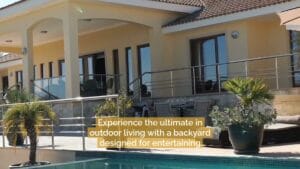 Modern house with large windows, a covered patio, outdoor seating, palm plants, and a swimming pool in the foreground; text overlay promotes outdoor living for entertaining.