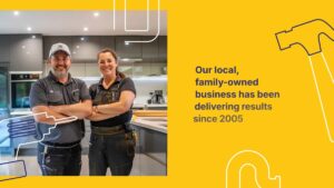 Two people in work attire stand smiling in a modern kitchen. Text beside them reads: "Our local, family-owned business has been delivering results since 2005.