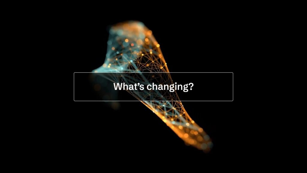 A digital abstract shape made of interconnected orange and blue nodes appears behind a translucent box with the text "What's changing?" centered on a black background.