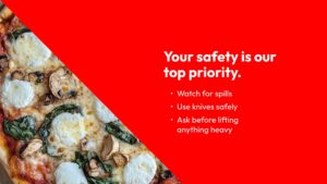 A pizza with mushrooms and mozzarella is partially visible beside a red panel displaying safety tips, including watching for spills and using knives safely.